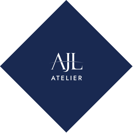 AJL Atelier white logo on blue lozenge